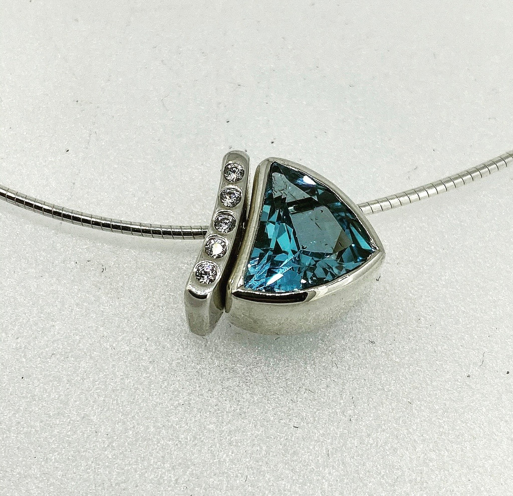 Blue Topaz and Five Diamond Pendant